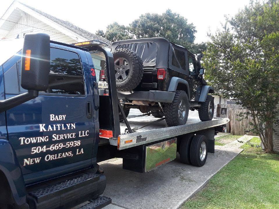 Baby Kaitlyn Flatbed Truck with black jeep on bed